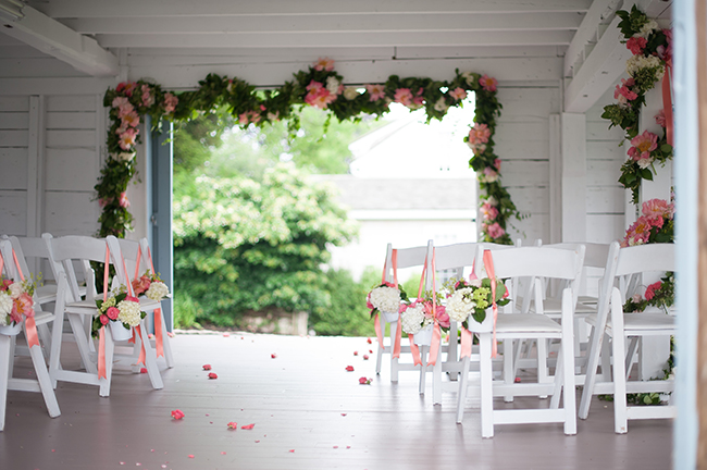 an intimate ceremony inside a barn