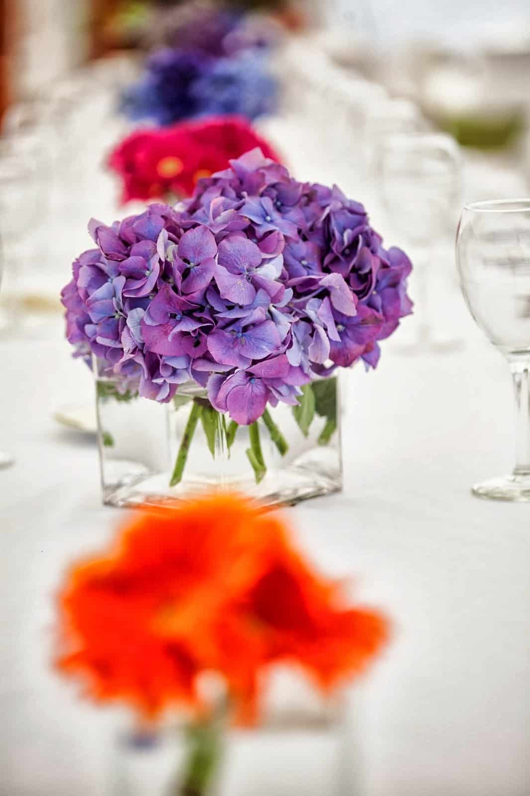 Brightly colored flowers from Sayles Livingston Design enhance a ...